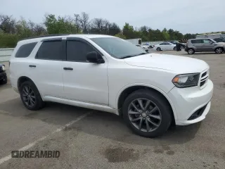 2018 Dodge Durango с VIN NY76958, выставлен на аукционе Copart как лот 55122245 с пробегом 102 413 миль миль и Списание • Salvage title. История ставок и продаж доступна на DreamBid. Изображение 4.