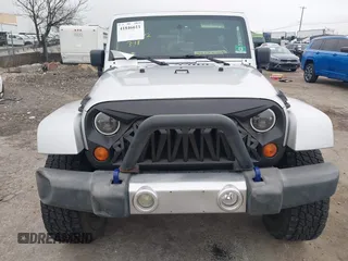 2008 Jeep Wrangler Unlimited Sahara с VIN 1J4GA59138L505460, выставлен на аукционе IAAI как лот 41846611 с пробегом 116 658 миль миль и . История ставок и продаж доступна на DreamBid. Изображение 12.