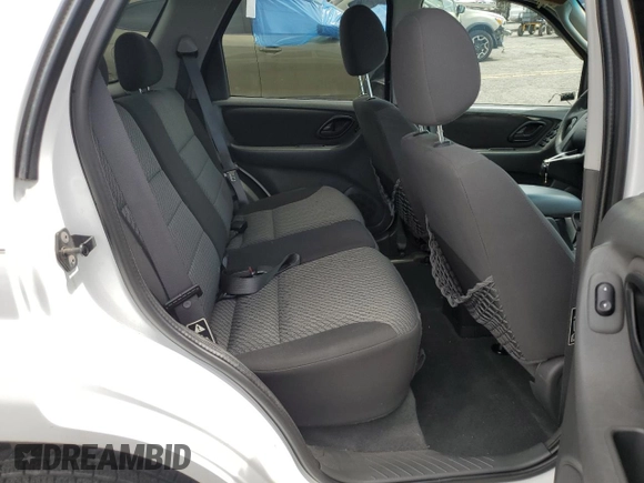 2003 Ford Escape XLT Popular 2 with VIN 1FMYU93133KD76423, listed as a Copart auction lot 57780455 with 98,779 mi miles and Salvage title. Bid and sale history available at DreamBid. Image 10.