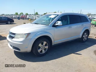 2009 Dodge Journey SXT with VIN 3D4GG57V19T211770, listed as a IAAI auction lot 42095045 with 164,610 mi miles. Bid and sale history available at carsss.com. Image 2.