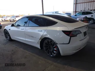 2021 Tesla Model 3 Performance with VIN 5YJ3E1EC4MF097993, listed as a IAAI auction lot 41366615 with 30,735 mi miles and . Bid and sale history available at DreamBid. Image 3.