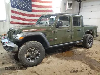 2023 Jeep Gladiator Rubicon with VIN 1C6JJTBG9PL568552, listed as a Copart auction lot 51935025 with 9,115 mi miles and Salvage title. Bid and sale history available at DreamBid. Image 1.