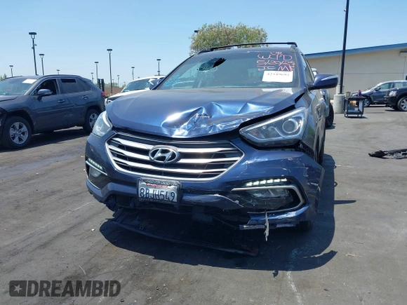 2018 Hyundai Santa Fe 2.0T z VIN 5XYZU4LA8JG537427, wystawiony jako IAAI lot #42349692 z przebiegiem 148 764 mil mil oraz . Historia ofert i sprzedaży dostępna na DreamBid. Obrazek 6.