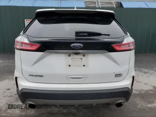 2020 Ford Edge SEL z VIN 2FMPK3J90LBB01559, wystawiony jako Copart lot #61365305 z przebiegiem 120 050 mil mil oraz Czysty tytuł • Clean title. Historia ofert i sprzedaży dostępna na DreamBid. Obrazek 6.