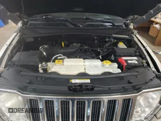 2010 Jeep Liberty Limited z VIN 1J4PN5GK3AW150858, wystawiony jako Copart lot #57888735 z przebiegiem 130 356 mil mil oraz Szkoda całkowita • Salvage title. Historia ofert i sprzedaży dostępna na DreamBid. Obrazek 11.