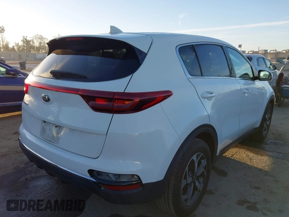 2020 Kia Sportage LX with VIN KNDPM3AC2L7733689, listed as a IAAI auction lot 41858043 with 93,979 mi miles and . Bid and sale history available at DreamBid. Image 4.