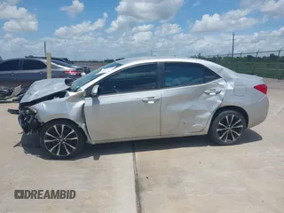 2017 Toyota Corolla L z VIN 5YFBURHE4HP732912, wystawiony jako IAAI lot #42451597 z przebiegiem 73 901 mil mil oraz . Historia ofert i sprzedaży dostępna na DreamBid. Obrazek 14.