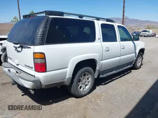 2005 Chevrolet Suburban Z71 with VIN 3GNFK16Z95G132975, listed as a IAAI auction lot 42042947 with 1 mi miles. Bid and sale history available at carsss.com. Image 4.