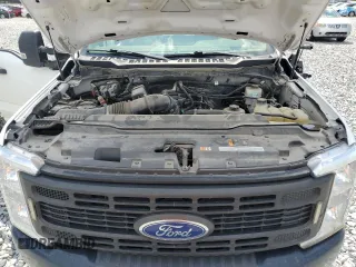 2023 Ford F-250 XL с VIN 1FT7X2BA4PEC40595, выставлен на аукционе Copart как лот 64612205 с пробегом 79 599 миль миль и Списание • Salvage title. История ставок и продаж доступна на DreamBid. Изображение 11.