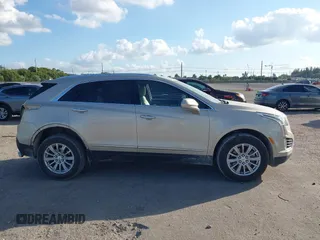 2017 Cadillac XT5 FWD with VIN 1GYKNARS0HZ174625, listed as a IAAI auction lot 41520634 with 116,169 mi miles. Bid and sale history available at carsss.com. Image 14.