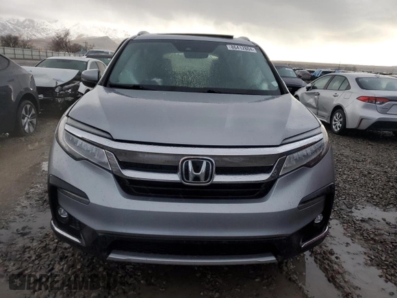 2020 Honda Pilot Touring 8-Passenger with VIN 5FNYF6H9XLB042625, listed as a Copart auction lot 86412804 with 52,061 mi miles and Salvage Title. Bid and sale history available at DreamBid. Image 5.