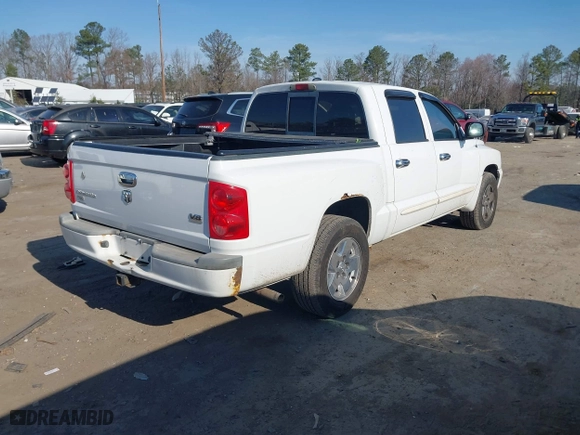 2005 Dodge Dakota Laramie with VIN 1D7HE58N95S138915, listed as a IAAI auction lot 41789883 with 342,402 mi miles. Bid and sale history available at carsss.com. Image 4.
