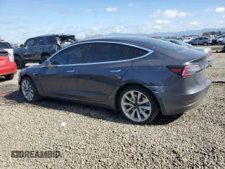 2018 Tesla Model 3 Long Range Battery with VIN 5YJ3E1EBXJF103797, listed as a Copart auction lot 47920715 with Not Provided miles and Salvage Title. Bid and sale history available at DreamBid. Image 2.