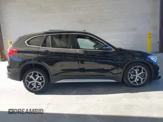 2018 BMW X1 xDrive28i z VIN WBXHT3C35J5L25056, wystawiony jako IAAI lot #42185474 z przebiegiem 62 631 mil mil oraz . Historia ofert i sprzedaży dostępna na DreamBid. Obrazek 13.