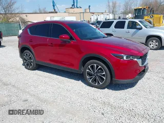 2022 Mazda CX-5 2.5 S Premium Package with VIN JM3KFBDM5N1532837, listed as a IAAI auction lot 41869721 with 59,249 mi miles. Bid and sale history available at carsss.com. Image 1.