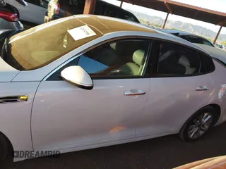 2016 Kia Optima EX with VIN 5XXGU4L30GG117411, listed as a IAAI auction lot 42034988 with 123,387 mi miles. Bid and sale history available at carsss.com. Image 14.