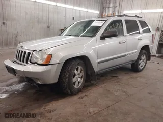 2009 Jeep Grand Cherokee Laredo with VIN 1J8GR48KX9C516873, listed as a IAAI auction lot 41610781 with 199,246 mi miles. Bid and sale history available at carsss.com. Image 17.