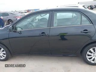 2013 Toyota Corolla L with VIN 5YFBU4EE9DP148748, listed as a IAAI auction lot 40919169 with 102,394 mi miles and . Bid and sale history available at DreamBid. Image 15.