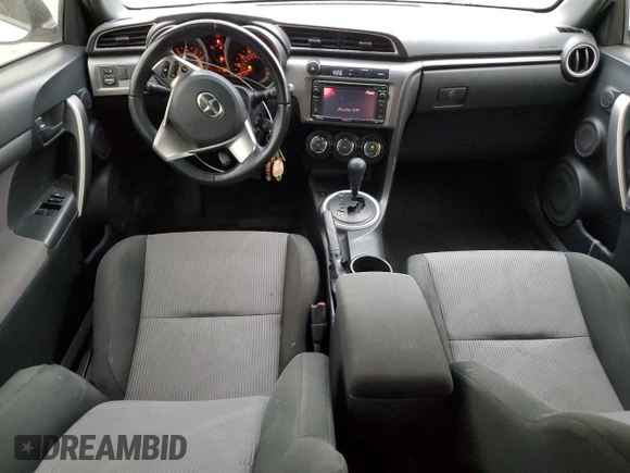 2014 Scion tC z VIN JTKJF5C7XE3079538, wystawiony jako Copart lot #85018414 z przebiegiem 136 905 mil mil oraz Czysty tytuł • Clean title. Historia ofert i sprzedaży dostępna na DreamBid. Obrazek 8.
