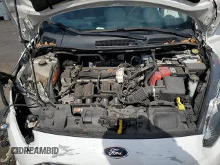 2019 Ford Fiesta SE z VIN 3FADP4EJ5KM106732, wystawiony jako Copart lot #55856145 z przebiegiem 79 778 mil mil oraz Szkody całkowita. Historia ofert i sprzedaży dostępna na DreamBid. Obrazek 11.