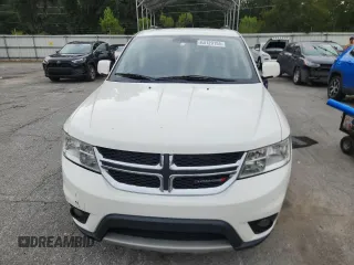 2017 Dodge Journey SXT z VIN 3C4PDCBG9HT571161, wystawiony jako Copart lot #64129155 z przebiegiem 260 314 mil mil oraz Czysty tytuł • Clean title. Historia ofert i sprzedaży dostępna na DreamBid. Obrazek 5.