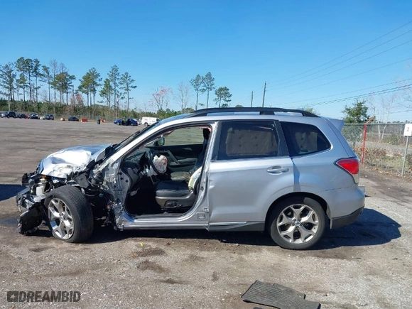 2017 Subaru Forester Touring with VIN JF2SJAWC7HH523883, listed as a IAAI auction lot 41595014 with 74,654 mi miles. Bid and sale history available at carsss.com. Image 15.