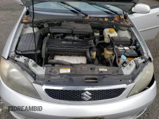 2005 Suzuki Reno S z VIN KL5JD66Z95K217050, wystawiony jako Copart lot #86785194 z przebiegiem 77 614 mil mil oraz Szkody całkowita. Historia ofert i sprzedaży dostępna na DreamBid. Obrazek 13.
