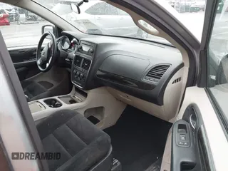 2016 Dodge Grand Caravan SXT with VIN 2C4RDGCG3GR321933, listed as a IAAI auction lot 41895209 with 186,502 mi miles and . Bid and sale history available at DreamBid. Image 5.