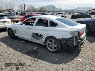 2015 BMW 4 Series 428i xDrive with VIN WBA4C9C58FG135227, listed as a Copart auction lot 44178973 with 91,571 mi miles and . Bid and sale history available at DreamBid. Image 2.