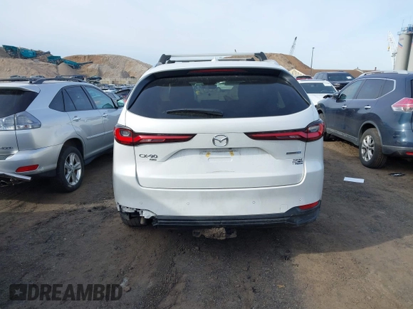 2024 Mazda CX-90 Premium with VIN JM3KKDHA2R1134742, listed as a IAAI auction lot 41575953 with 17,968 mi miles and . Bid and sale history available at DreamBid. Image 16.