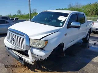 2012 Toyota Tundra 4WD Truck LTD with VIN 5TFHW5F1XCX269682, listed as a IAAI auction lot 41968019 with 166,074 mi miles. Bid and sale history available at carsss.com. Image 18.
