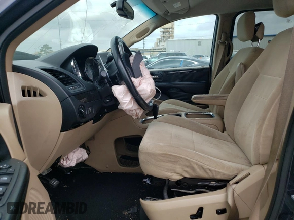 2014 Dodge Grand Caravan SXT with VIN 2C4RDGCGXER209286, listed as a Copart auction lot 51536975 with 173,821 mi miles and Salvage Title. Bid and sale history available at DreamBid. Image 7.