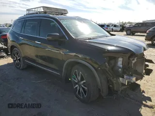 2019 Honda Pilot Touring 7-Passenger z VIN 5FNYF5H69KB019903, wystawiony jako Copart lot #43598805 z przebiegiem 144 486 mil mil oraz Szkoda całkowita • Salvage title. Historia ofert i sprzedaży dostępna na DreamBid. Obrazek 4.