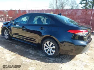 2023 Toyota Corolla LE with VIN 5YFB4MDE7PP053269, listed as a IAAI auction lot 41573252 with 31,852 mi miles. Bid and sale history available at carsss.com. Image 3.