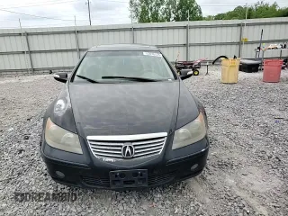 2006 Acura RL z VIN JH4KB16586C010597, wystawiony jako Copart lot #53846535 z przebiegiem 212 219 mil mil oraz Szkoda całkowita • Salvage title. Historia ofert i sprzedaży dostępna na DreamBid. Obrazek 13.