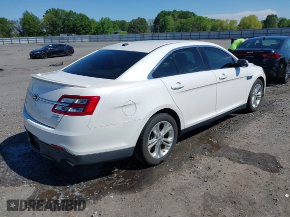 2013 Ford Taurus SEL with VIN 1FAHP2E80DG179961, listed as a IAAI auction lot 42088532 with 131,196 mi miles and . Bid and sale history available at carsss.com. Image 4.