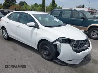 2015 Toyota Corolla L z VIN 5YFBURHE3FP325662, wystawiony jako IAAI lot #42249187 z przebiegiem 104 015 mil mil oraz . Historia ofert i sprzedaży dostępna na DreamBid. Obrazek 1.