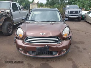 2014 MINI Countryman with VIN WMWZB3C51EWR36737, listed as a IAAI auction lot 41741248 with 69,717 mi miles and . Bid and sale history available at DreamBid. Image 13.