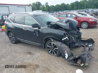 2017 Nissan Rogue SV with VIN 5N1AT2MV6HC764325, listed as a IAAI auction lot 42578397 with 127,063 mi miles and . Bid and sale history available at DreamBid. Image 1.