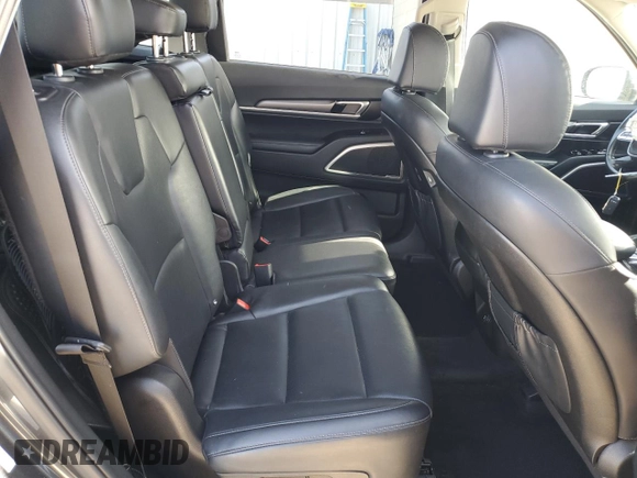 2022 Kia Telluride LX z VIN 5XYP24HC4NG280943, wystawiony jako Copart lot #87219584 z przebiegiem 50 369 mil mil oraz Szkoda całkowita • Salvage title. Historia ofert i sprzedaży dostępna na DreamBid. Obrazek 11.