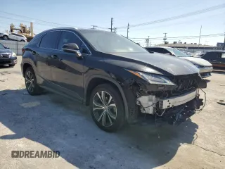2016 Lexus RX with VIN 2T2ZFMCA6GC001537, listed as a Copart auction lot 50252175 with 132,685 mi miles and Salvage Title. Bid and sale history available at DreamBid. Image 4.