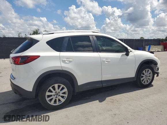 2015 Mazda CX-5 Sport z VIN JM3KE2BE6F0546994, wystawiony jako Copart lot #61948075 z przebiegiem 111 845 mil mil oraz Czysty tytuł • Clean title. Historia ofert i sprzedaży dostępna na DreamBid. Obrazek 3.
