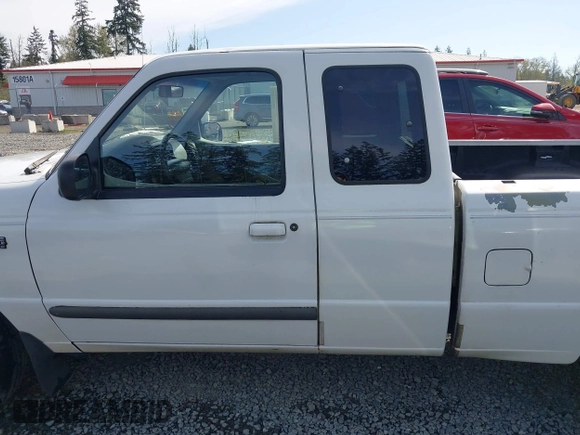 1999 Ford Ranger XLT with VIN 1FTYR14X0XPA65325, listed as a IAAI auction lot 42009611 with 218,657 mi miles. Bid and sale history available at carsss.com. Image 15.