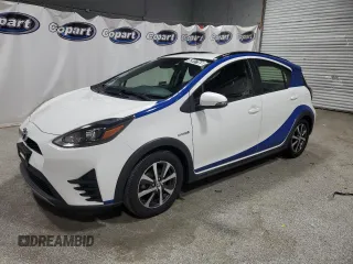 2018 Toyota Prius One z VIN JTDKDTB30J1615682, wystawiony jako Copart lot #52917165 z przebiegiem 67 246 mil mil oraz Czysty tytuł • Clean title. Historia ofert i sprzedaży dostępna na DreamBid. Obrazek 1.