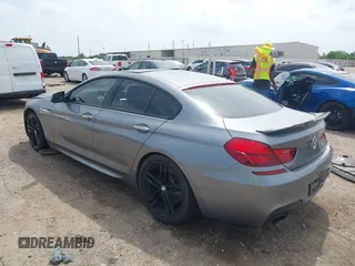 2014 BMW 6 Series 650i z VIN WBA6B2C55ED128934, wystawiony jako IAAI lot #42070641 z przebiegiem 102 597 mil mil oraz . Historia ofert i sprzedaży dostępna na DreamBid. Obrazek 3.