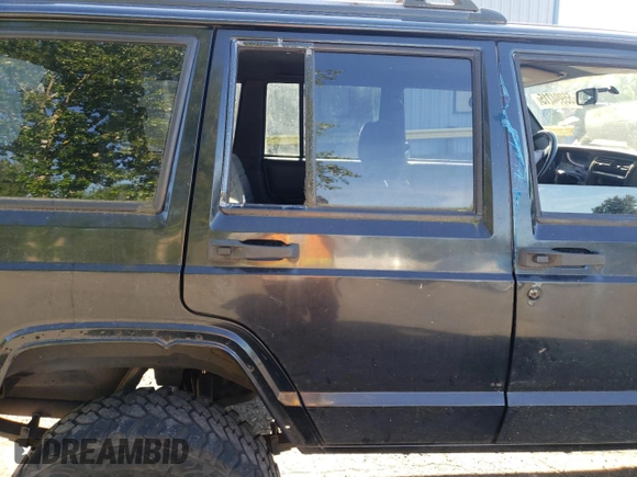 2000 Jeep Cherokee z VIN 1J4FF48S3YL180200, wystawiony jako Copart lot #55994215 z przebiegiem 209 182 mil mil oraz Szkoda całkowita • Salvage title. Historia ofert i sprzedaży dostępna na DreamBid. Obrazek 11.