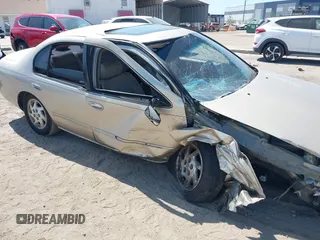 1999 Nissan Maxima GXE z VIN JN1CA21A8XT109136, wystawiony jako IAAI lot #42180758 z przebiegiem 136 876 mil mil oraz . Historia ofert i sprzedaży dostępna na DreamBid. Obrazek 6.