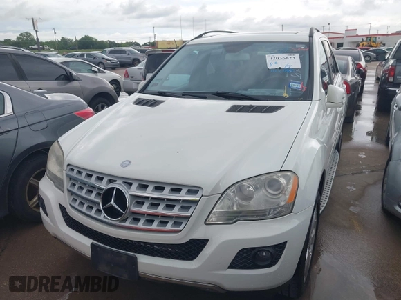 2011 Mercedes-Benz M 350 with VIN 4JGBB5GB5BA627082, listed as a IAAI auction lot 42036823 with 164,098 mi miles and . Bid and sale history available at DreamBid. Image 6.