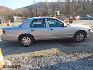 2005 Ford Crown Victoria LX with VIN 2FAFP74W85X121984, listed as a IAAI auction lot 41427678 with 113,437 mi miles. Bid and sale history available at carsss.com. Image 13.