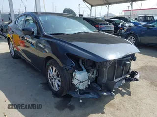 2016 Mazda 3 i Touring with VIN JM1BM1V7XG1337627, listed as a IAAI auction lot 42463249 with 122,292 mi miles and . Bid and sale history available at DreamBid. Image 1.